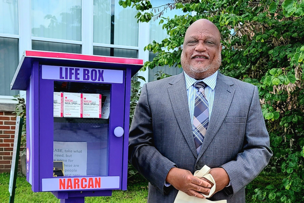 Mayor Epps at Narcan box outside Pine Lawn City Hall.
