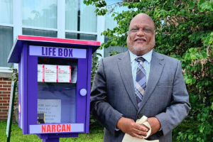 Mayor Epps at Narcan box outside Pine Lawn City Hall.